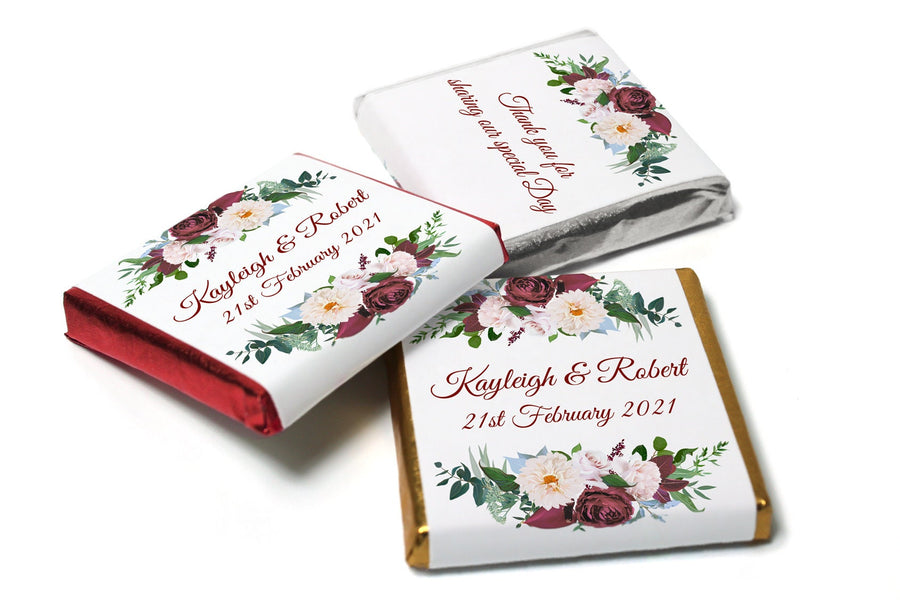 Floral Neapolitan chocolates personalised for elegant wedding favours.