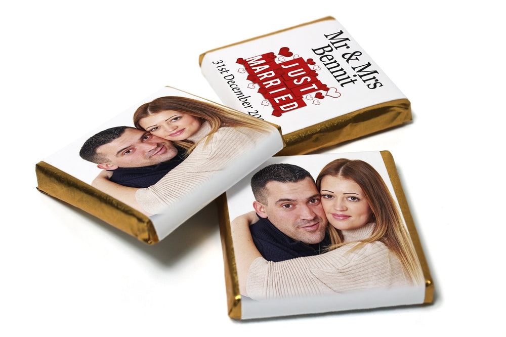 Personalised Neapolitan chocolates featuring a Mr & Mrs design for wedding guest favours.