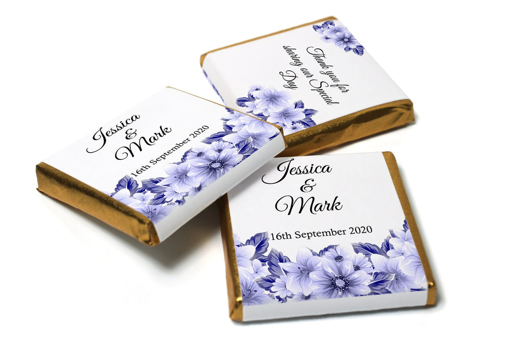 Personalized wedding chocolates with purple floral wrappers and names Jessica & Mark.